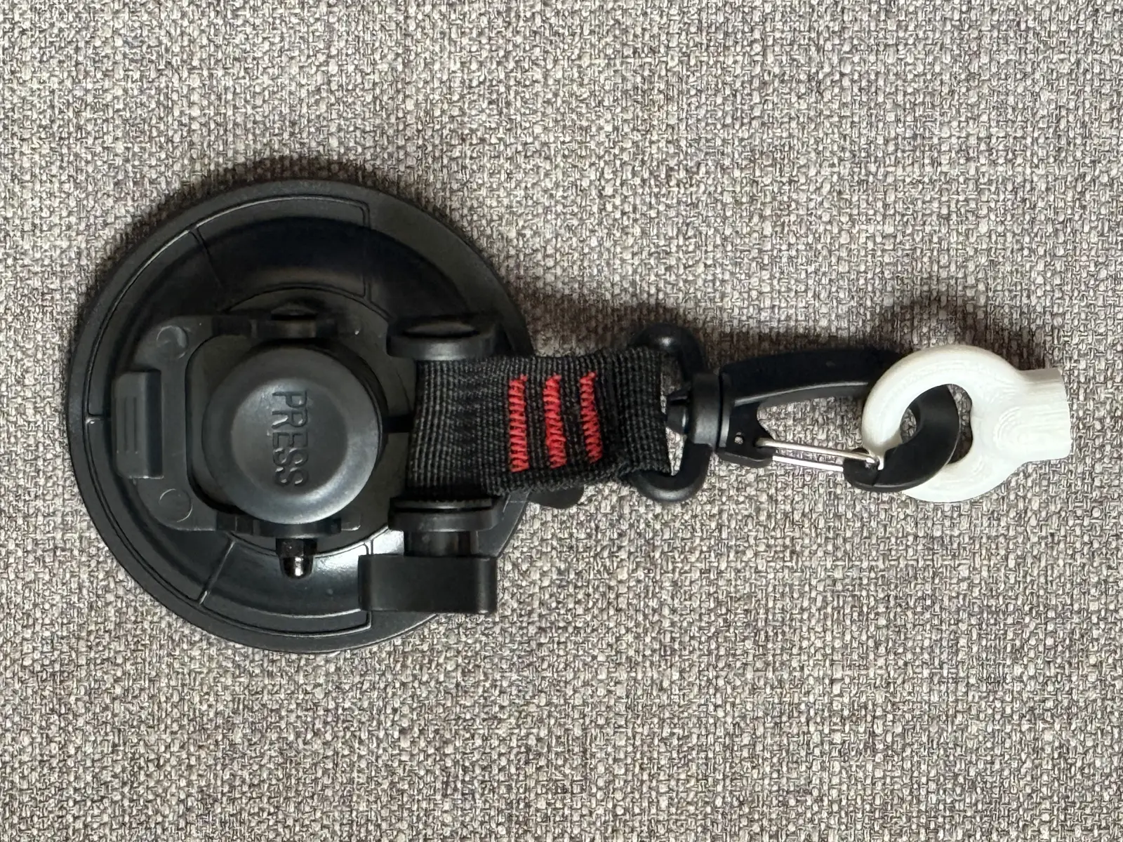 Suction cup anchor with clip and twist-lock connector